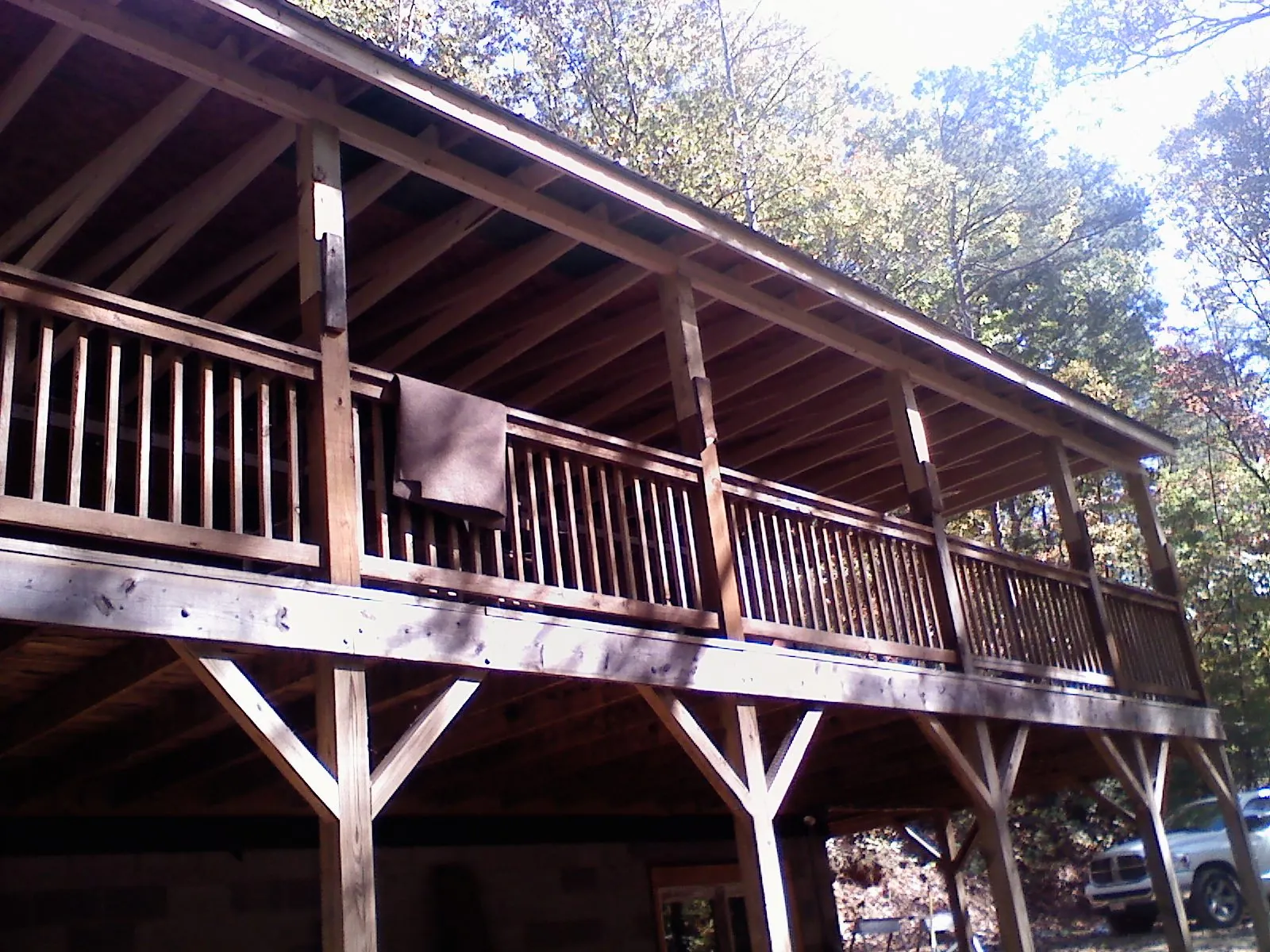Timber framing under a new elevated porch and deck — Roof Leak Repair in Longview by Roofing Brothers